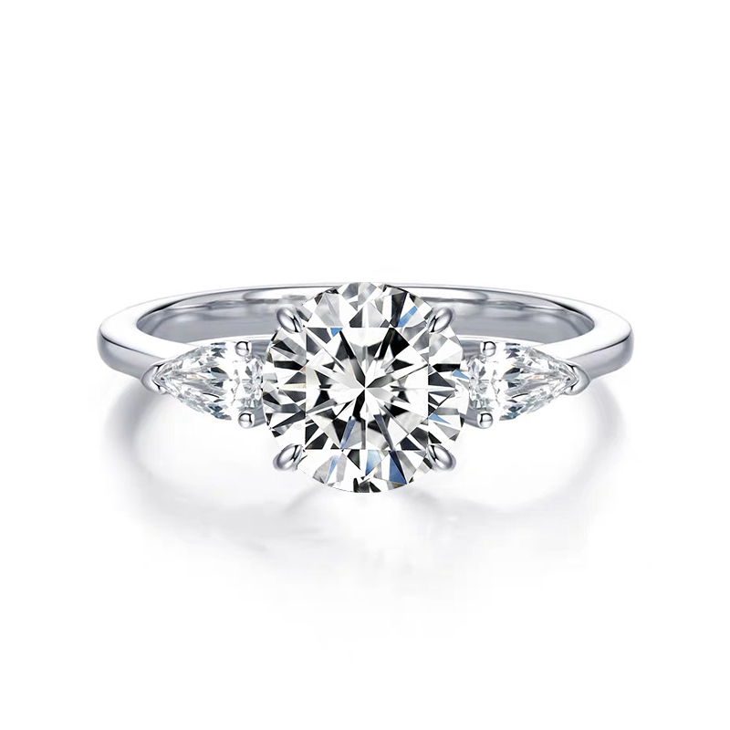 4 or 8 Prong Round Cut Main Stone With 2 Pear Cut Shoulder Stone Diamond Ring