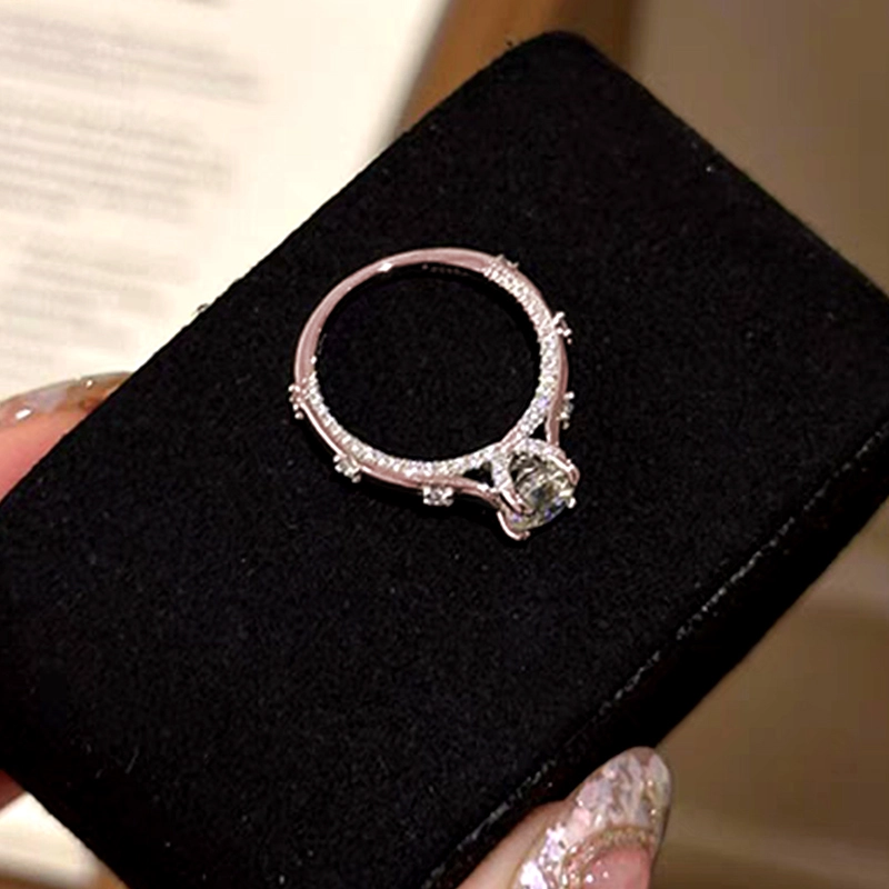 Sparkling 4 Prong Round Solitaire Diamond Ring With Accents and Double Side Halo Shoulder