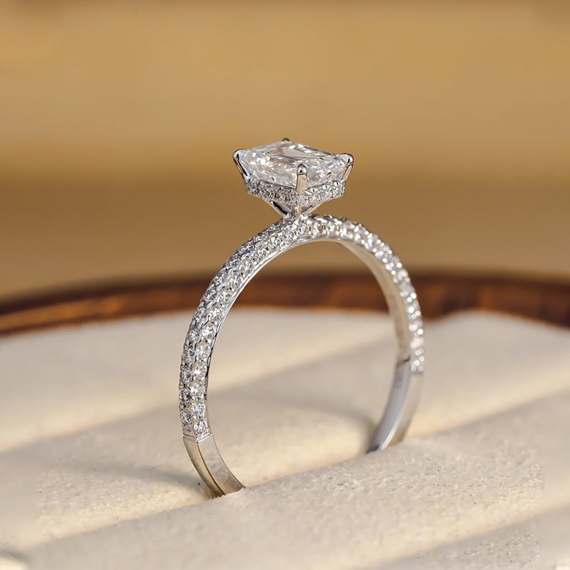 Emerald Cut Four Prong Hidden Halo Diamond Ring With 3 Sides Half Pave Band