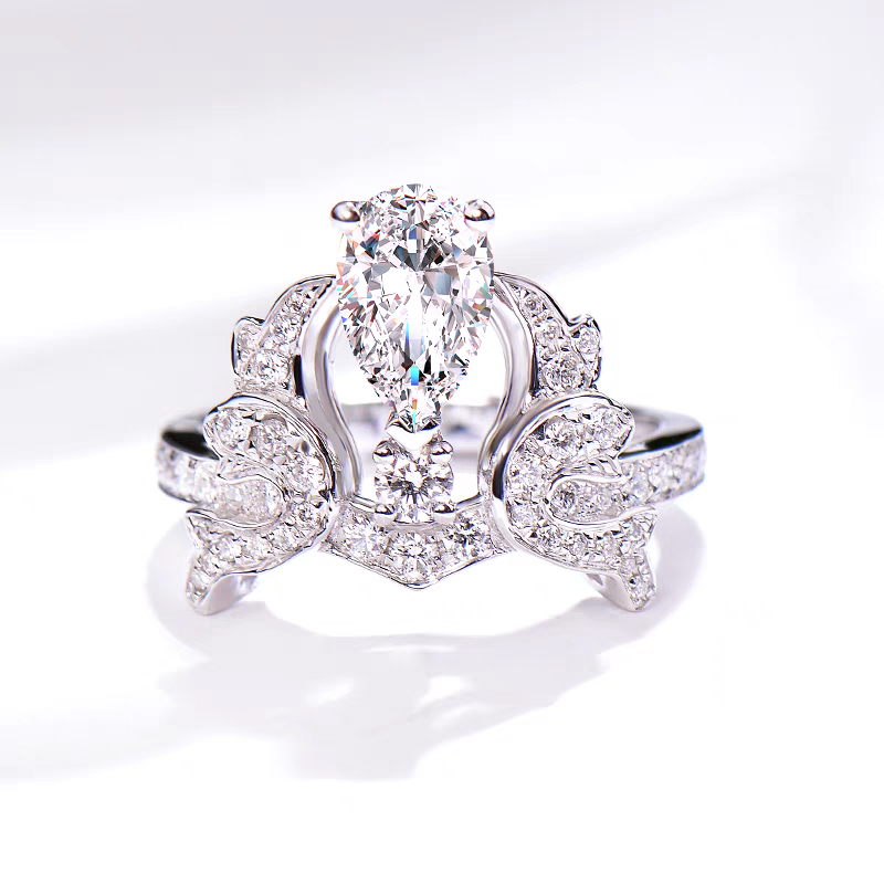 Crown Inspired Pear Cut Main Stone Diamond Ring With Half Pave Shank