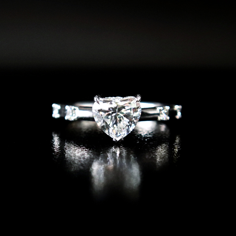 Heart Shaped Solitaire Cultivated Diamond Ring With Accents on Both Cathedral Shank